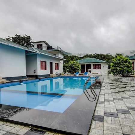 Treebo Trend Misty Garden Resorts With Mountain View Munnar Exterior photo